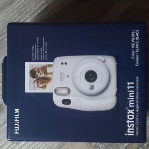 Fujifilm Instax Mini 11 Polaroid Camera pack of film. Both new and unopened